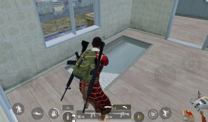 PUBG MOBILE player holding a stair angle for close-range combat